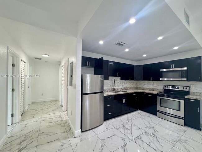 Building Photo - 7703 NW 3rd Ave Unit n/a
