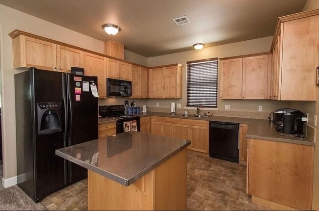 Photo - Spacious 4-Bedroom Home with New Paint & Carpet, Fenced Yard