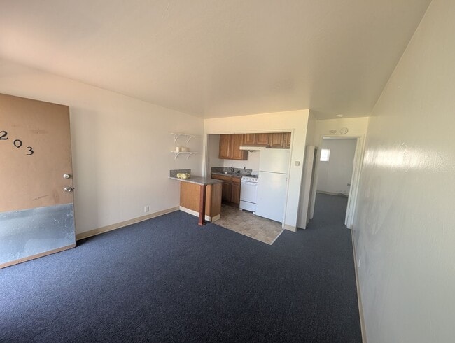 Photo - Comfortable one bedroom unit, convenient location to shopping and transportation Unit 203