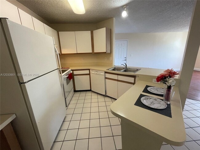 Building Photo - 4015 W McNab Rd Unit D212