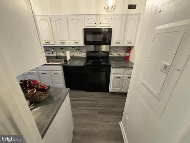 Building Photo - 1001 26th St NW Unit 705