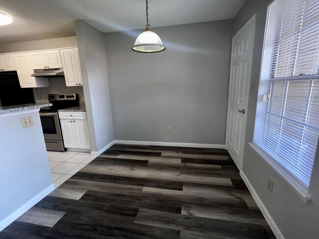 Photo - 3/2 Regency Gardens 1st Floor Condo with New Plank Fooring, Stainless Appliances, and Fresh Paint!