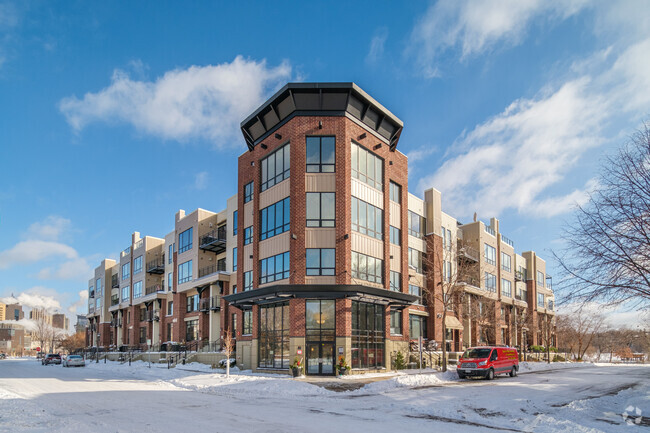 Front of Building - Riverfront Flats Apartments