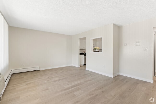 2BR, 1BA - 850SF - Living Room - Twin Fountain Apartments