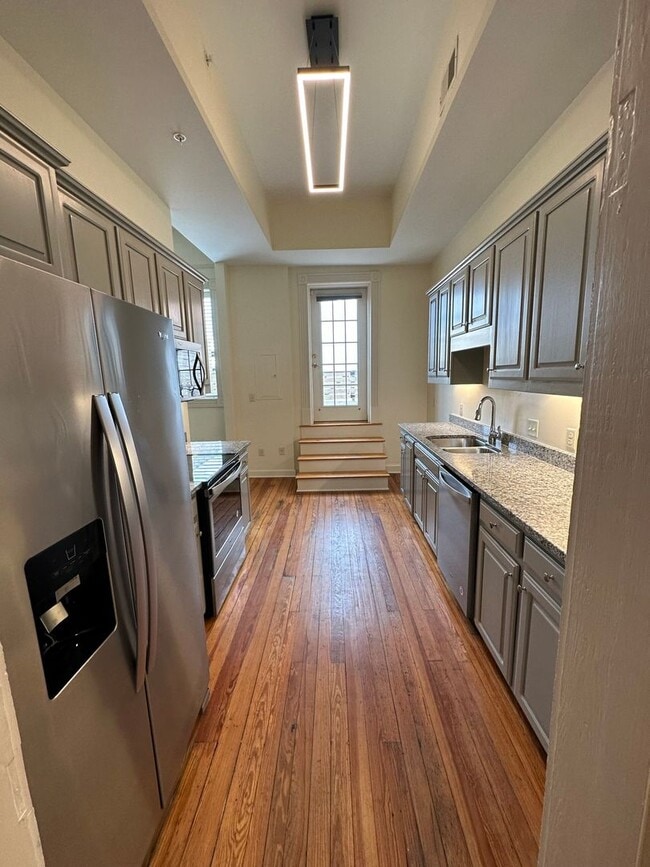 Photo - Spacious 3 Bedroom/3 Bathroom Townhome with Private Rooftop Deck