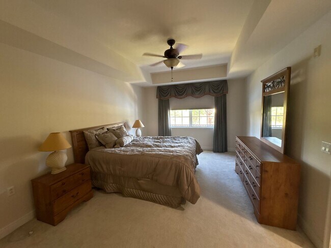 Building Photo - Lakeview Elegance in Porto Vista — 2 Bed / 2 Bath Condo with Private Garage