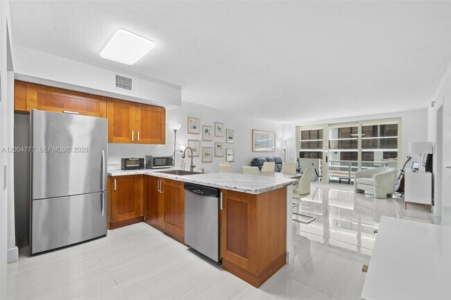 Building Photo - 9499 Collins Ave Unit 207