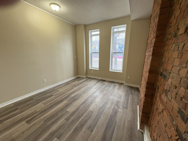 Photo - 1 Bedroom Main Floor With In-suite Laundry and Parking Unit 1