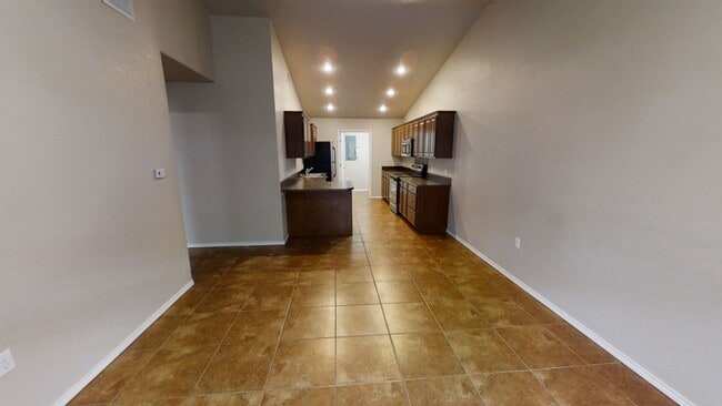 Building Photo - 1105 W 15th St Unit B