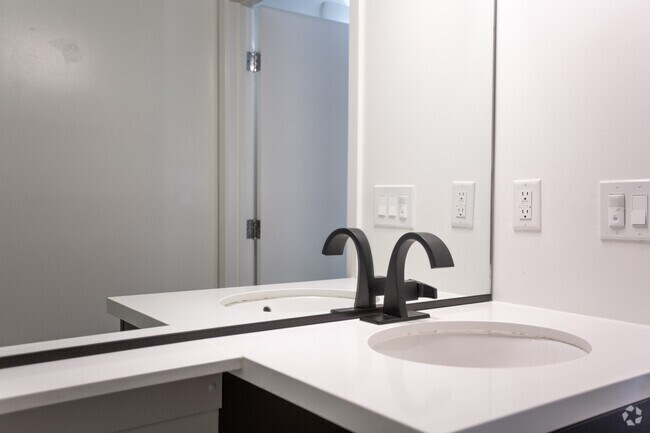 Modern styled bathroom with shower and tub.