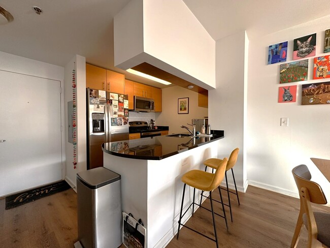 Building Photo - 102 Christopher Columbus Dr Unit 302