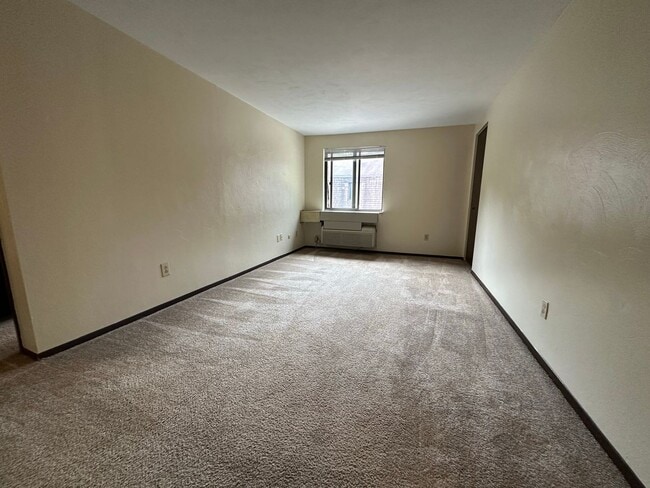 Photo - Amazing 1 Bedroom with Beautiful Exposed Brick! Off-Street Parking & Laundry Included! Unit 312