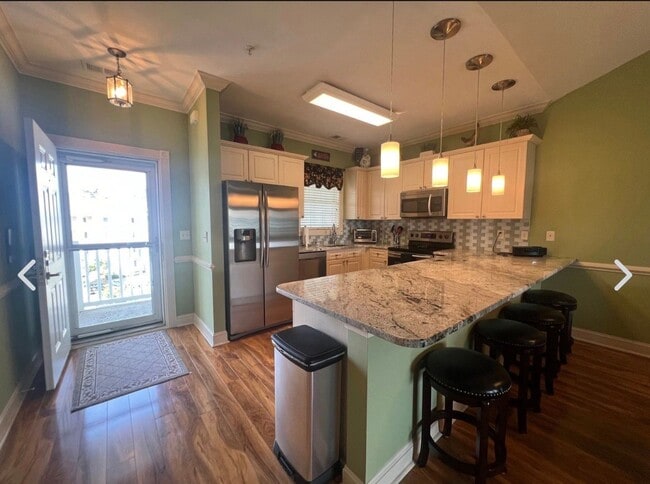 Photo - 4887 Luster Leaf Cir Unit 402