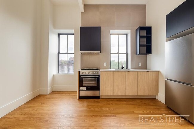 Photo - Spacious Renovated 2-Bedroom Apartment with Modern Comforts Unit 4