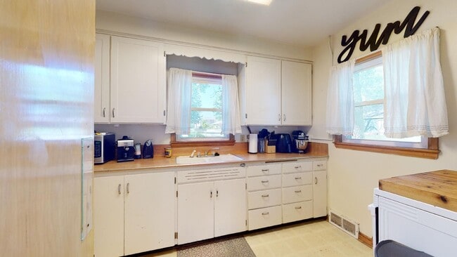 Photo - Home w/Yard & Garage