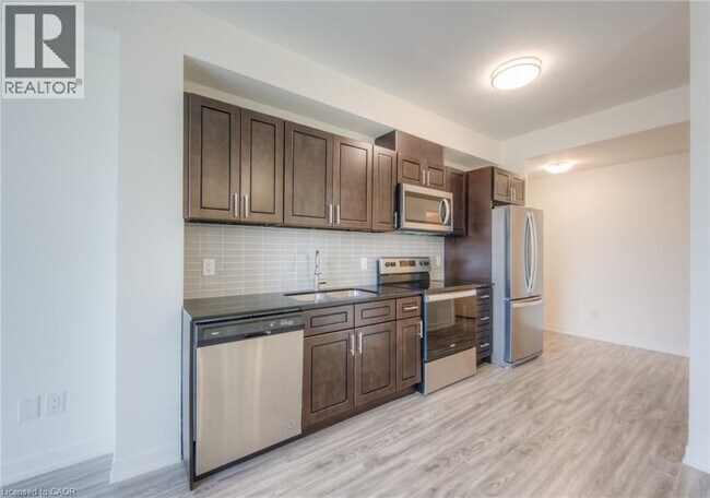 Photo - 128 King St N Unité 1502