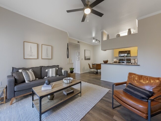 Living Room with Ceiling Fan - Indigo Creek Apartments