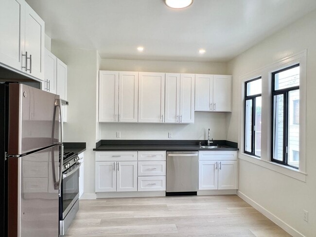 Photo - Top Floor 2BR/1BA + Newly Renovated Unit! Parking! In-Unit Laundry! PROGRESSIVE Unit 50 Moulton