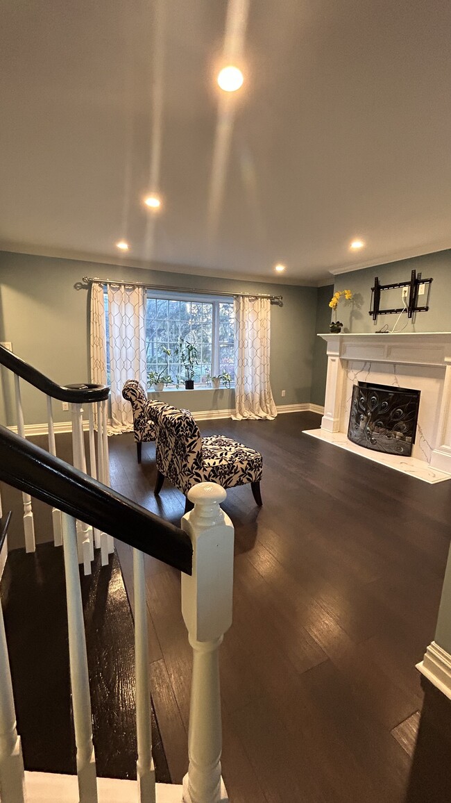 Living Room with Fireplace - 115 Falls Bridge Dr Townhome