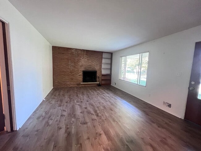 Photo - Two Bedroom Duplex SE Side w/ Decorative Fireplace! One Stall in Garage!
