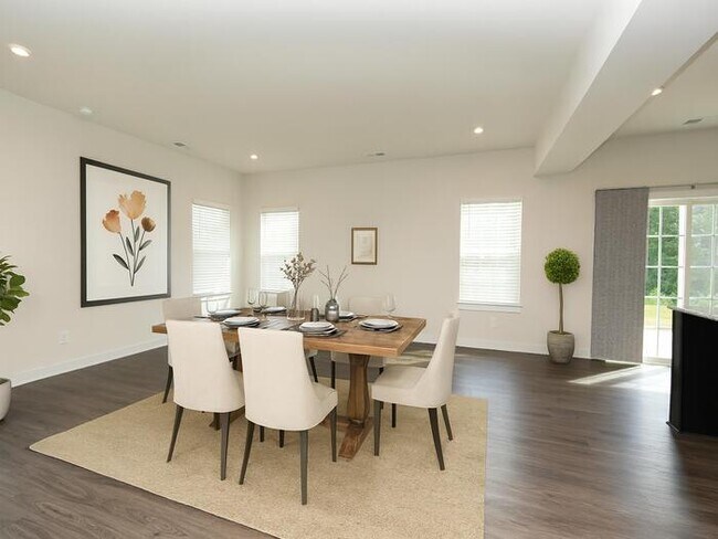Photo - This wonderful home has a covered rocking chair front porch