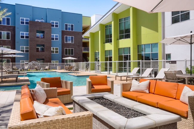 Your personal resort, every day. The Garrett Uptown pool deck features a fire pit lounge, resort-style seating, water features, and private cabanas — the ultimate Arizona outdoor living experience.