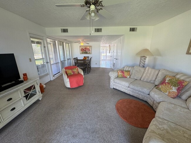 Photo - FULLY FURNISHED 2-Story Townhouse on Canal – Pool, Golf Views & ALL Utilities Included!