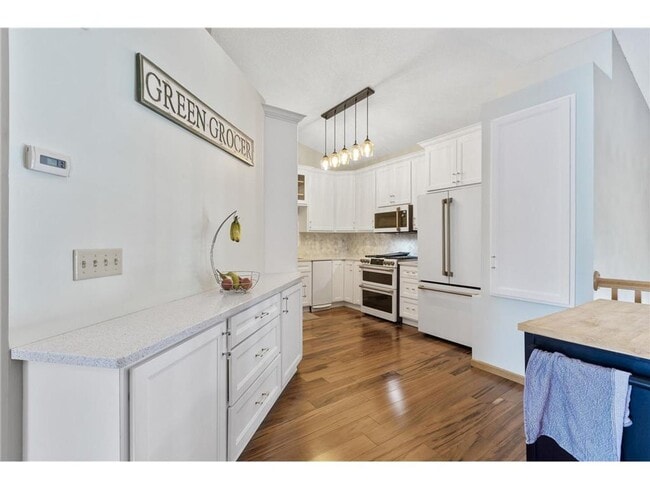 Photo - Updated 3BR Townhome in Rogers | Garage + Pool Access