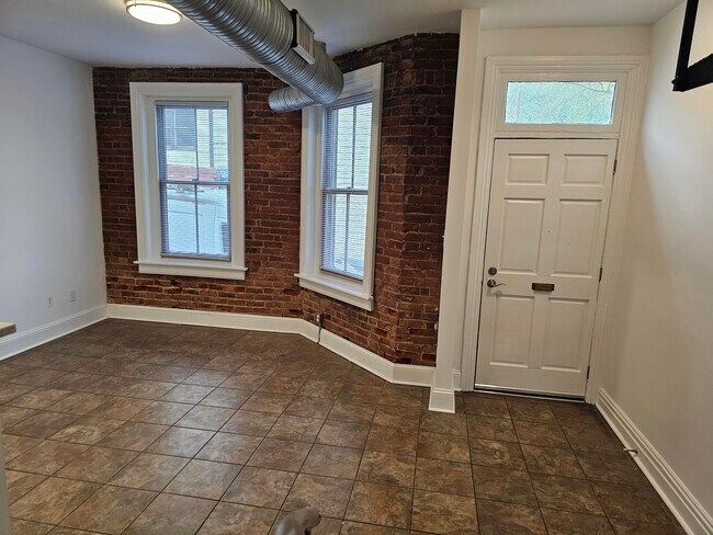 Front living area - 513 N Henry St Townhome