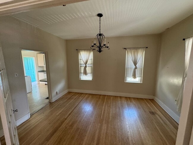 Photo - 4 Br, 2 Ba with kitchen appliances and bas...