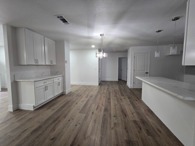 Photo - 3 Br 2 BA with extra room in back available now