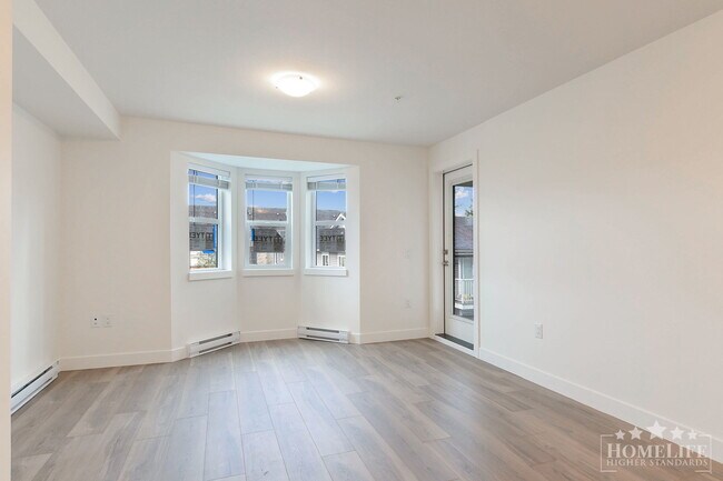 Photo - 2 Bed + 2 Bath + 1 Den Condo for Rent in L... Unit 203