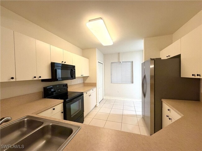 Building Photo - 7819 Regal Heron Cir Unit 8-101