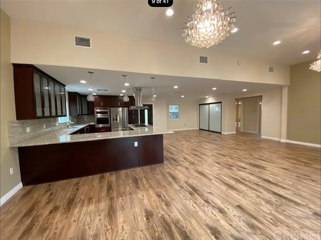 Building Photo - 6657 Enfield Ave