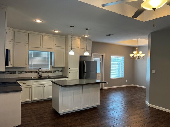 Building Photo - 3813 Whitewing Ave Unit #2 Rental