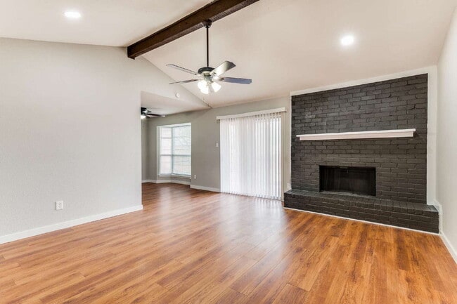 Photo - Light-Filled 3BR Brick Home featuring Granite Kitchen & Dual Living Spaces