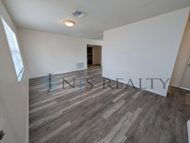 Photo - 3/2 over 1000sf home with New flooring, FRESH paint, open floorplan, primary suite with private b...