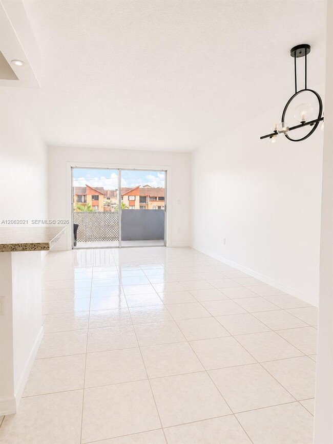 Building Photo - 6095 W 18th Ave Unit S216