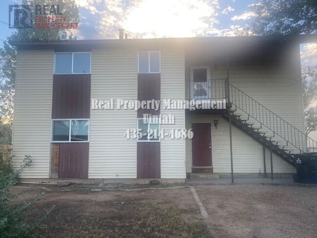 Building Photo - Cute 1-to-2-bedroom apartment