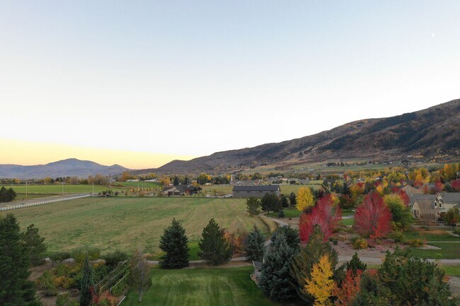 Photo - Beautiful home with 3 car garage and oversized covered deck.