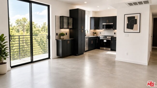 Building Photo - 10867 Fruitland Dr Unit 401