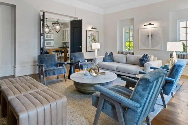 An inviting living room designed for gathering, conversation, and quiet moments alike—where refined furnishings and warm finishes create a welcoming space to relax or connect