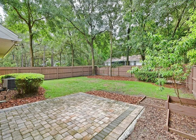Photo - Charming 3/2 with large fenced yard!