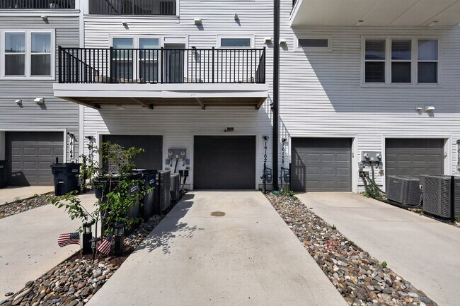 Photo - Stunning 2-Level Top Floor Condo with Tesla Charger & 70" TV – Farmstead District