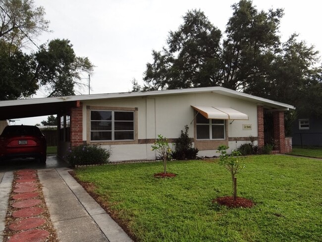 Building Photo - Port Charlotte Annual Rental. 2 bed, 2 bath, 1 carport
