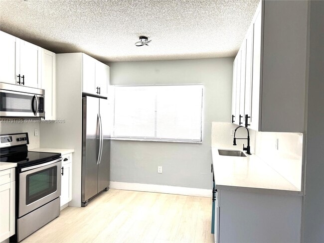 Building Photo - 6375 W 27th Way Unit 24 (203) Rental