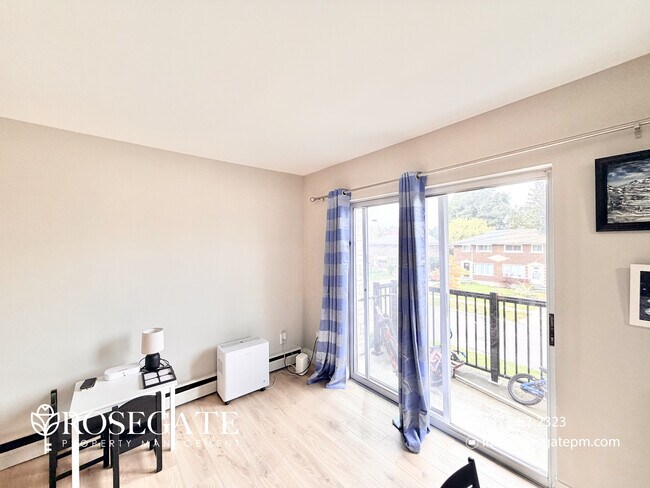 Photo - Bright & Spacious 2-Bedroom Apartment with... Unit 12