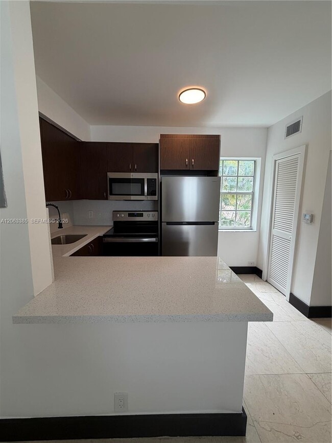 Photo - 551 NE 62nd St Unit 14