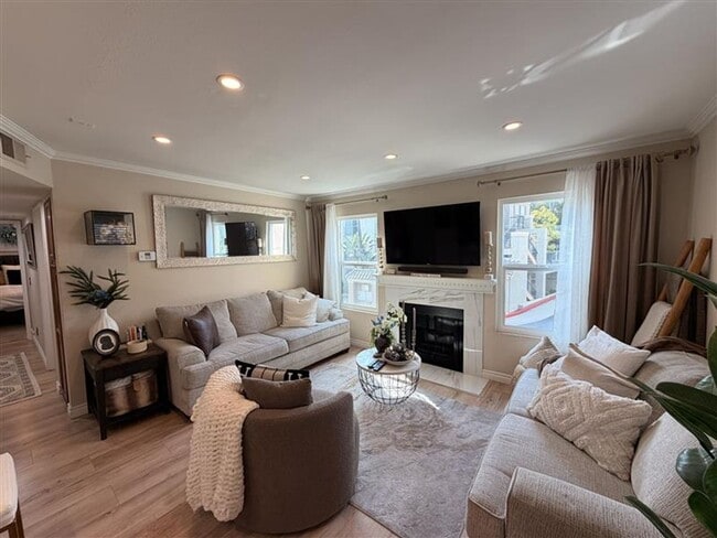 Photo - Recently Renovated Gated Long Beach Condo with Washer/Dryer, A/C, Pool, Gym, and 3 Parking Options Unit 231