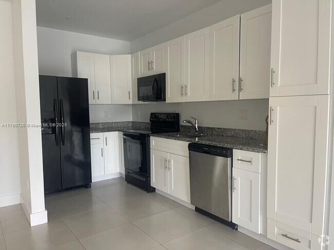 Building Photo - 2425 NW 24th Ave Unit 103 Rental